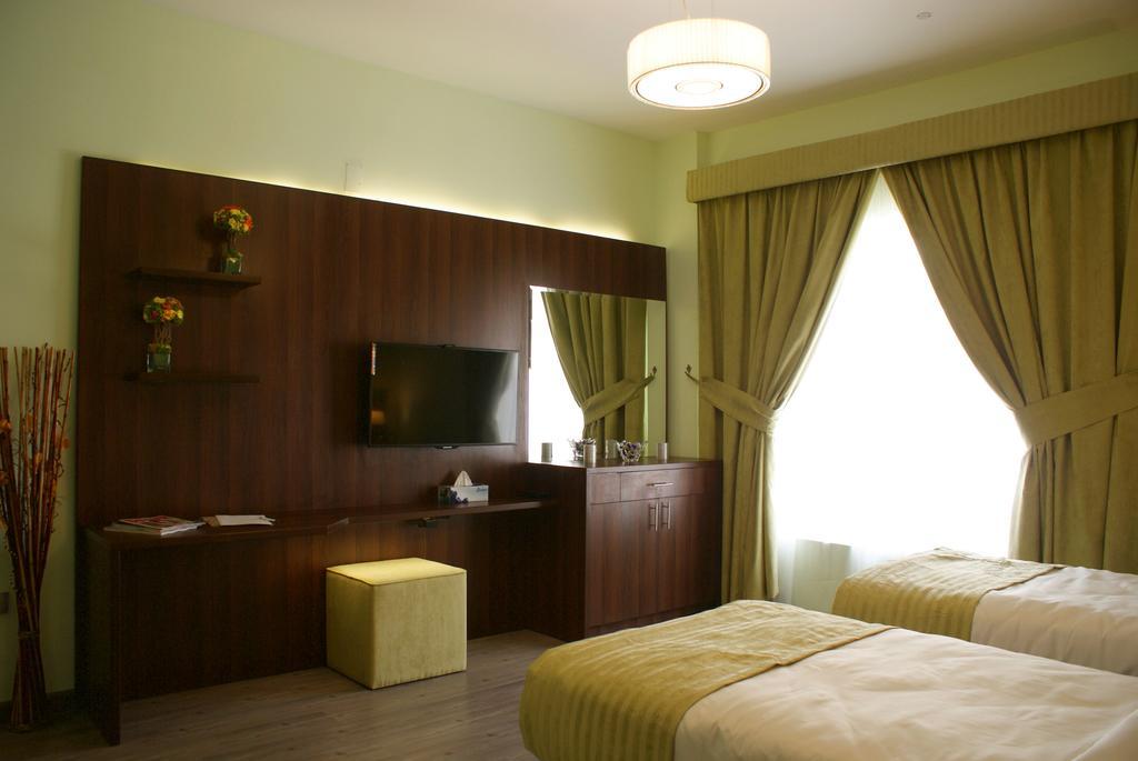Weekend Hotel & Apartments Muscat Værelse billede